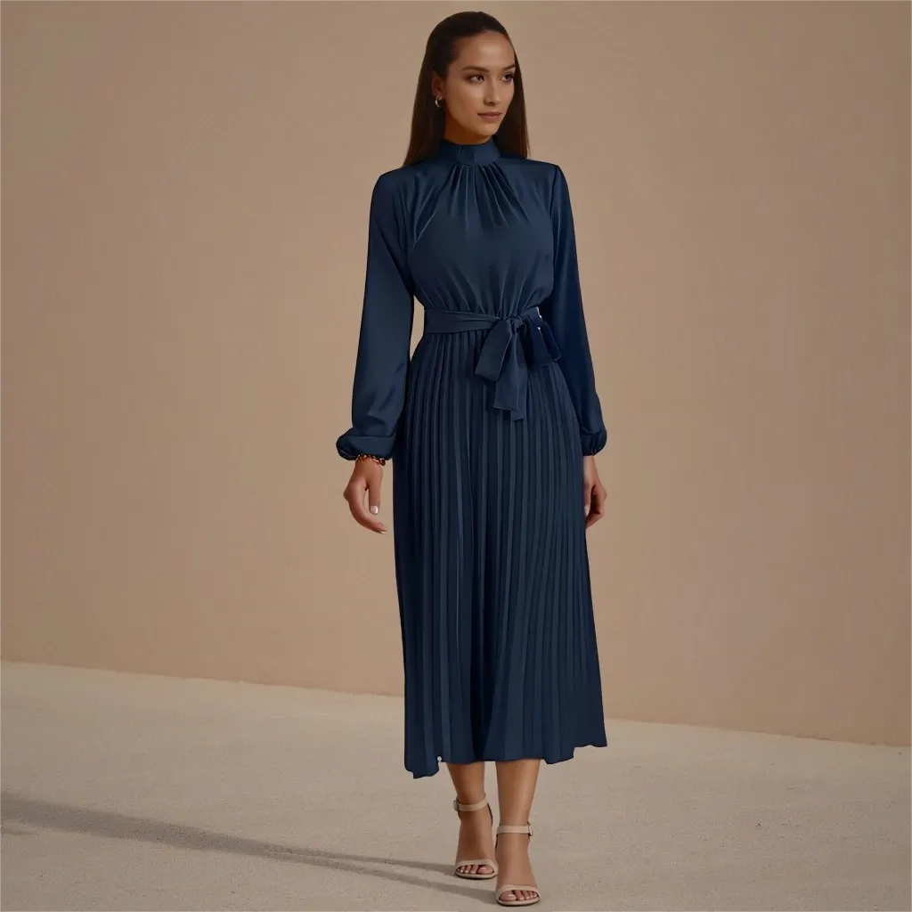 Woman wearing a navy blue dress against a beige background