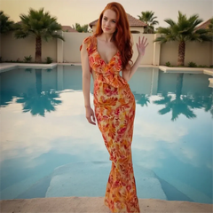 Woman in a floral dress standing by a pool with palm trees in the background